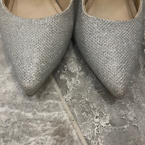 Size 8. Silver metallic heels. - Picture 2 of 7